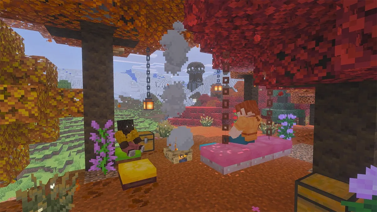 Two Minecraft characters camp beneath autumn trees with a straw bed, a lantern and a chest, from the Wilderness Bound drop